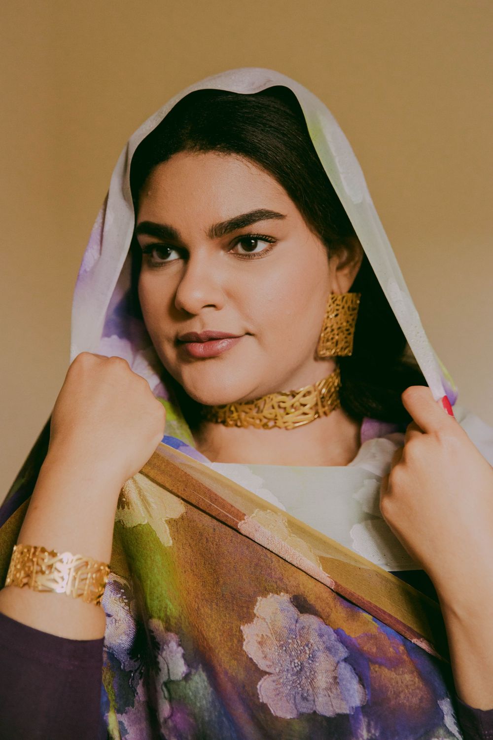 Portrait - Sudanese/Welsh Model wearing Toub in NORTH WALES, designed by HIMA RAHAMA. Photoshoot and Jewellery by KUKU Jewellery