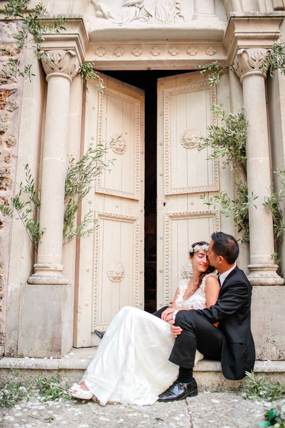 Garden seating with vintage chairs at Château de Massillan wedding venue in Provence