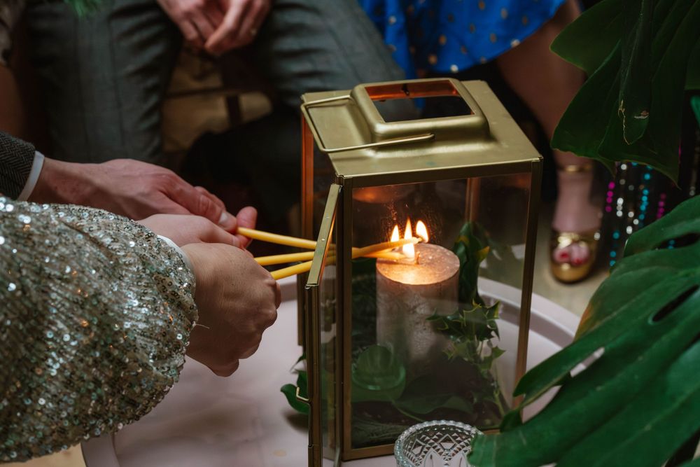 Matara Centre Wedding Photography Zara Davos Cotswolds Photographer Gloucestershire Stroud  candle in the ceremony