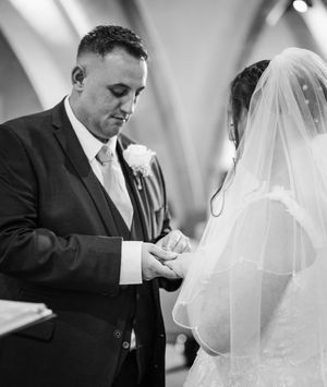 A black and white photo series showing closeup moments of a bride and groom during a wedding ceremony.