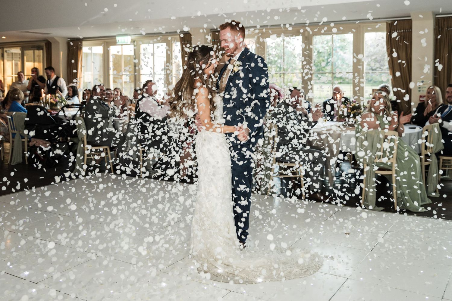 Bride & Groom at Kelham House, natural candid confetti photo.