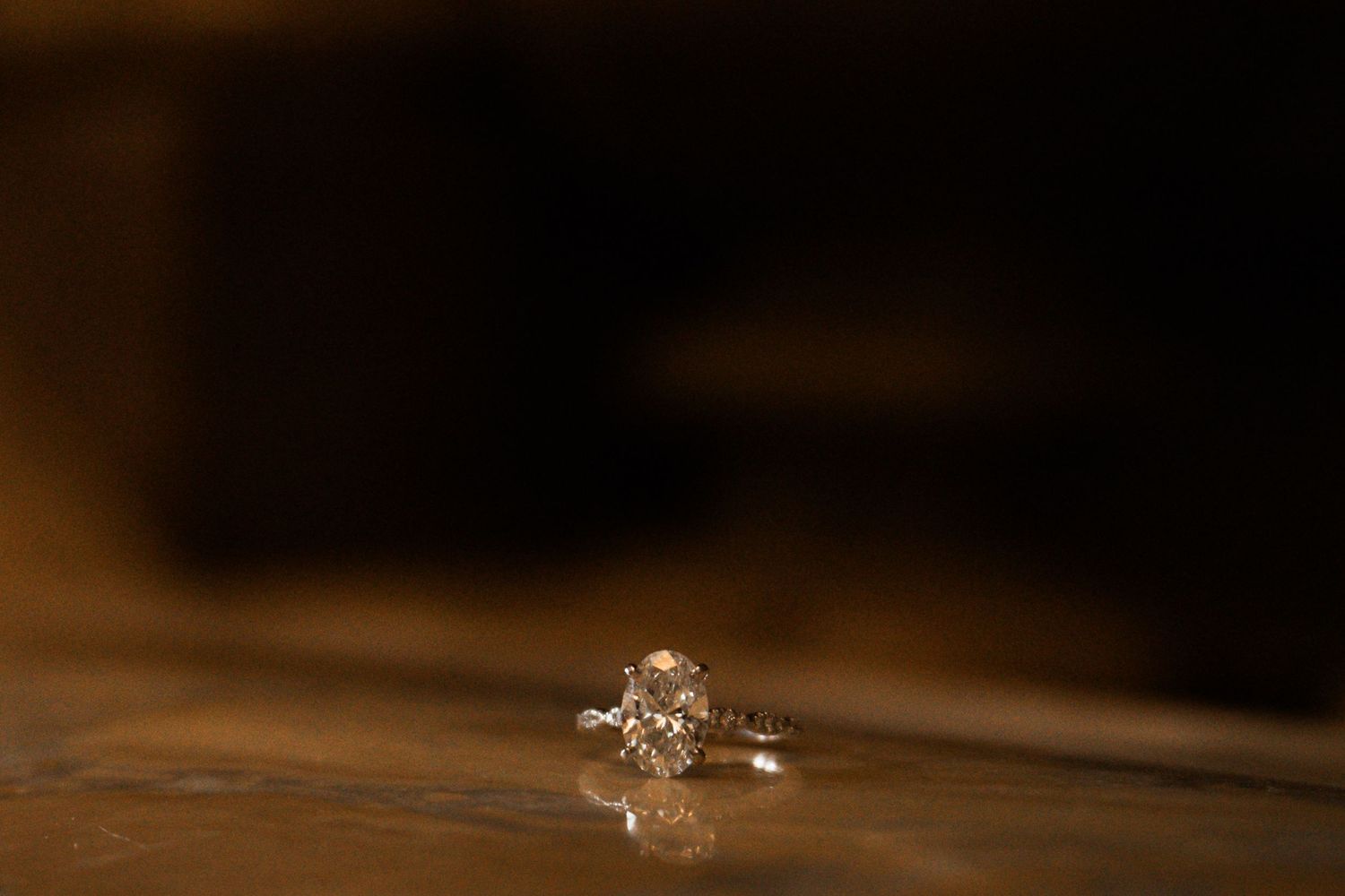 Close-up macro shots showing delicate engagement band.