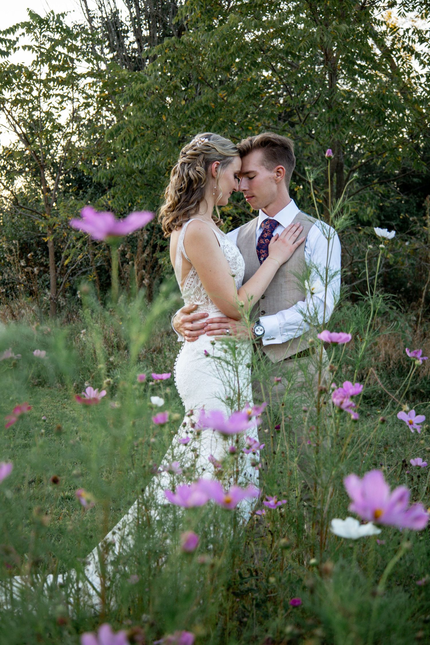 bride and groom in flower field at 2gather more wedding venue in michigan