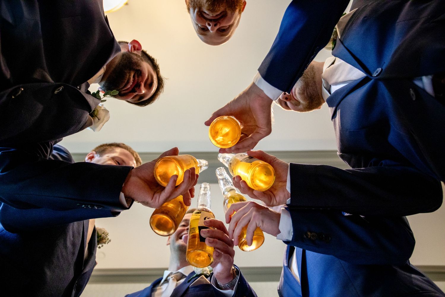 groom an cheers at 2gather more wedding venue in michigan