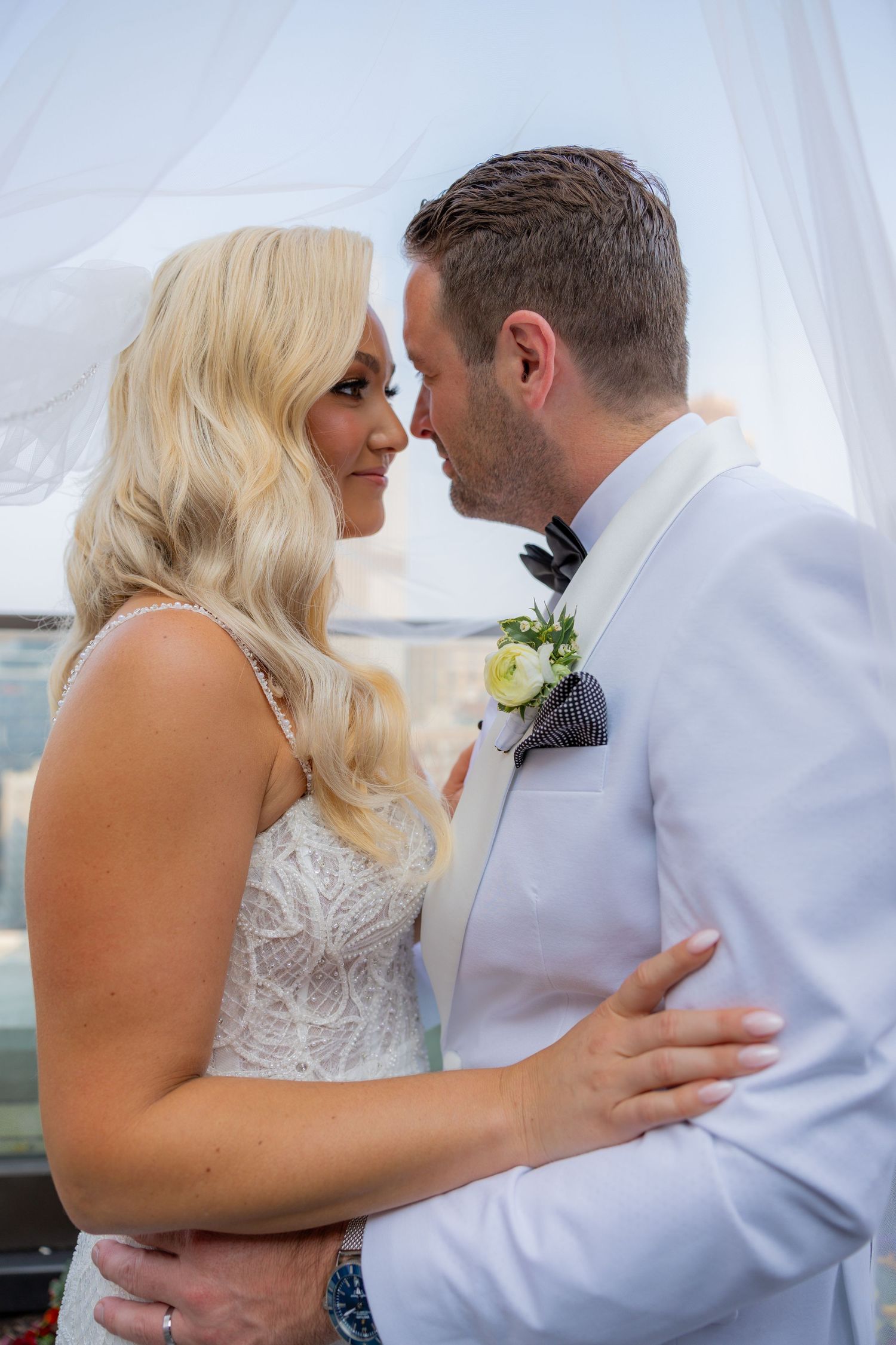 Bride and groom on rooftop at the book tower in Detroit Michigan