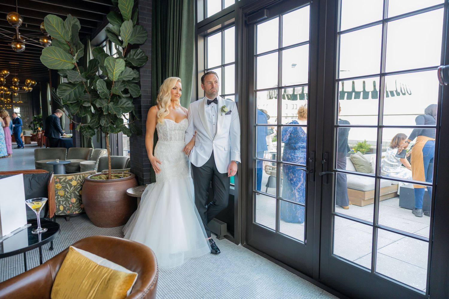 Bride and groom in cocktail lounge at the book tower in Detroit Michigan