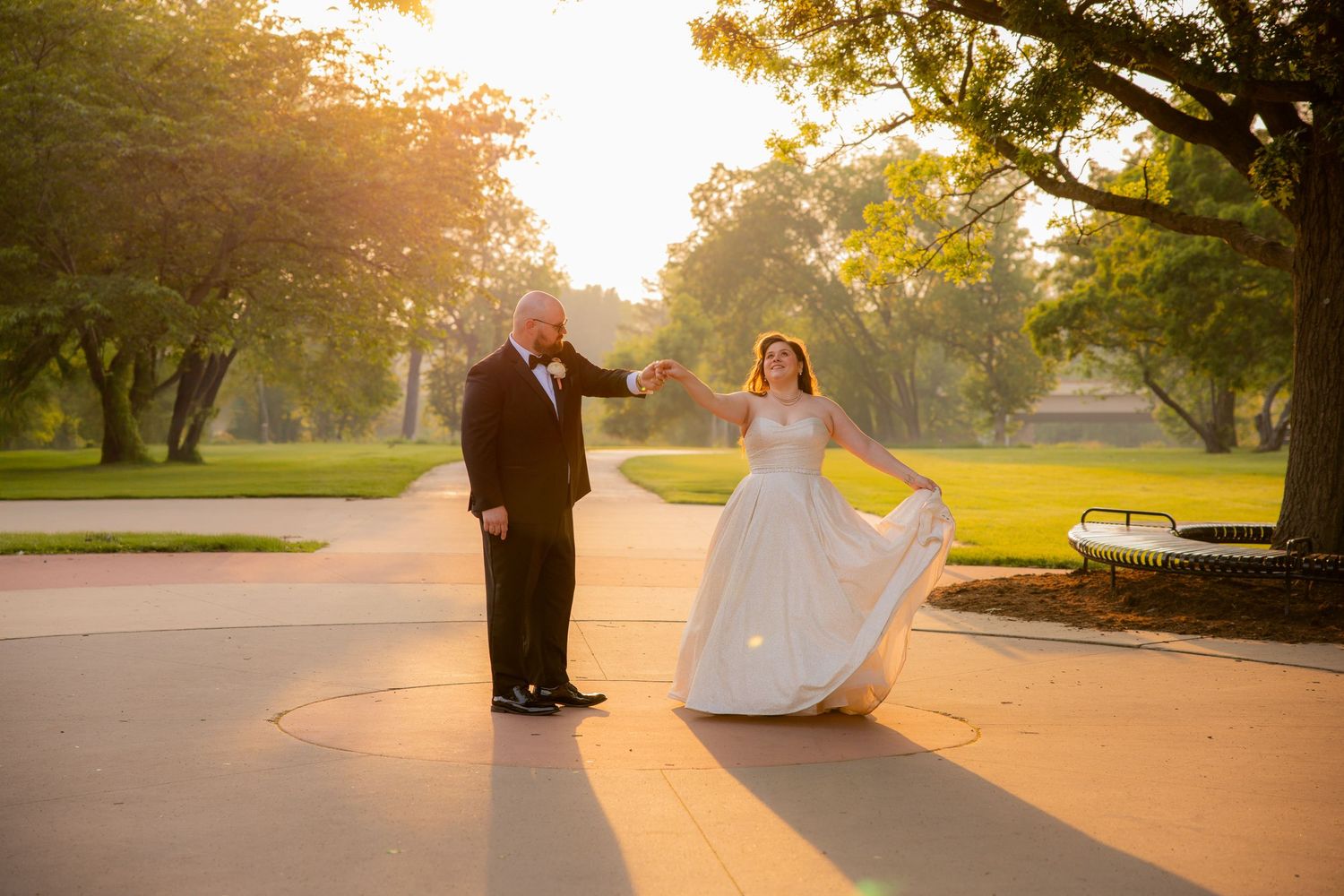 bride and groom dancing and spin shot at sunset in midtown michigan