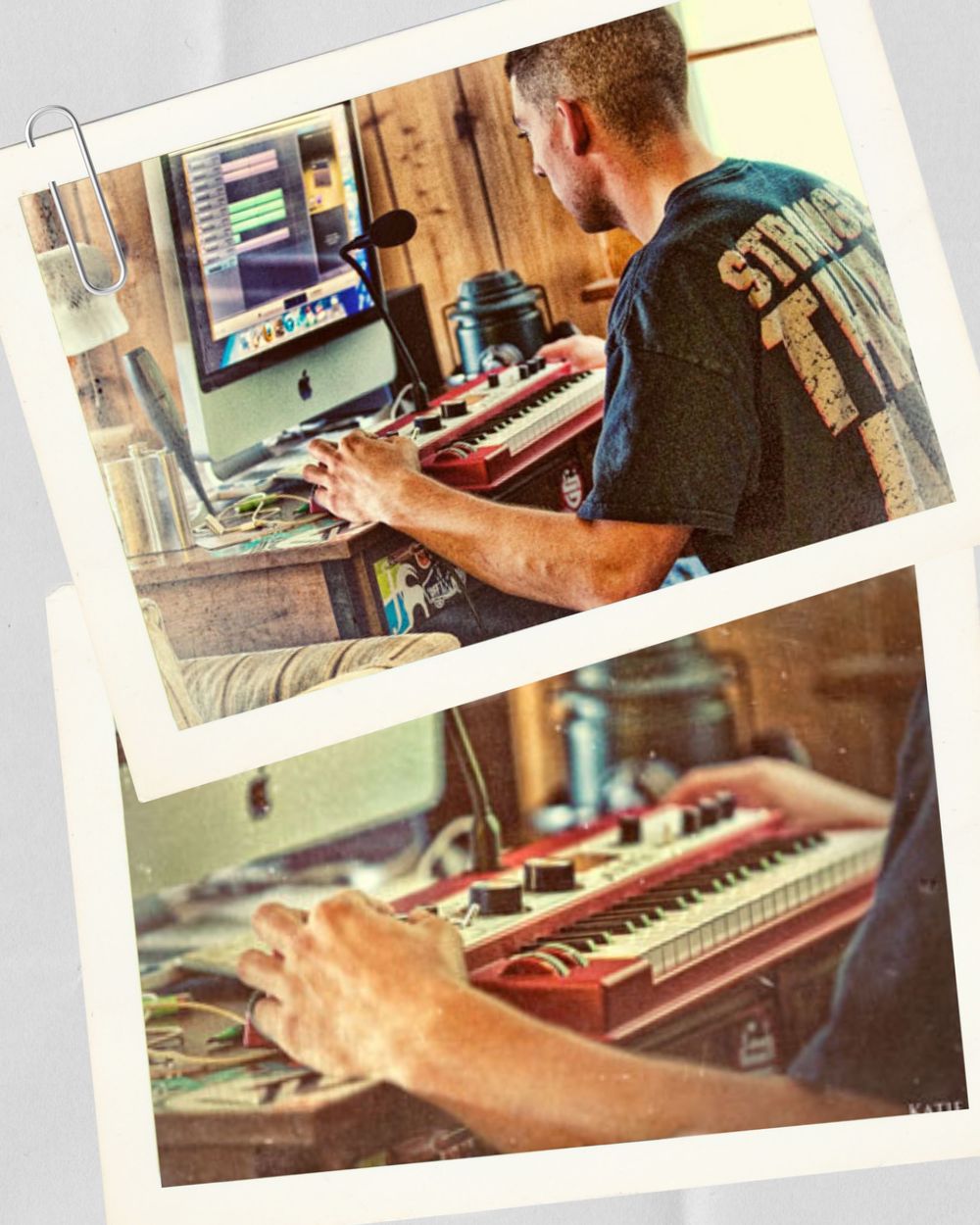 Man in studio t-shirt plays red keyboard synthesizer at music production workstation with computer monitor.