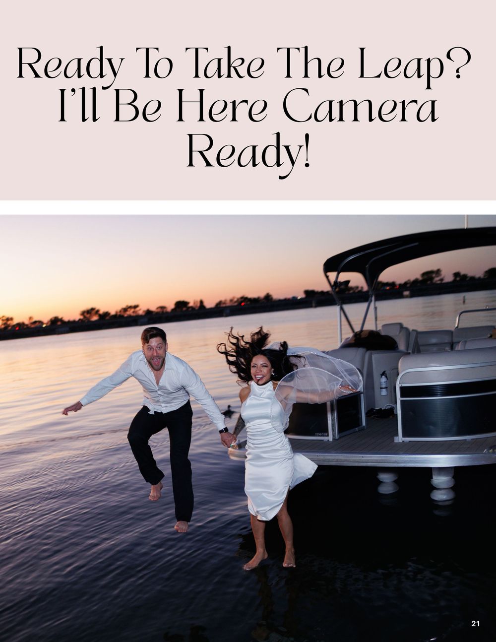 Couple joyfully leaping off a pontoon boat at sunset over water, bride in white dress, groom in black pants and white shirt.