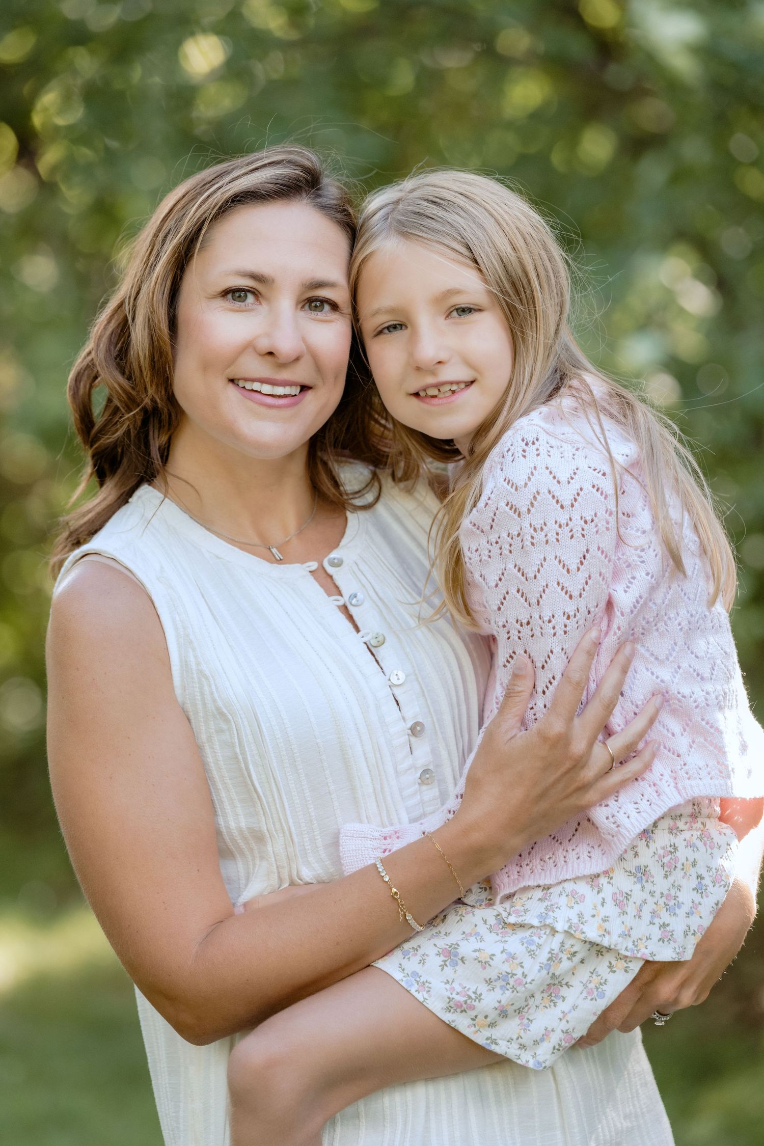 portrait of a mother and her daughter during an extended family portrait session at powers lake park in woodbury mn