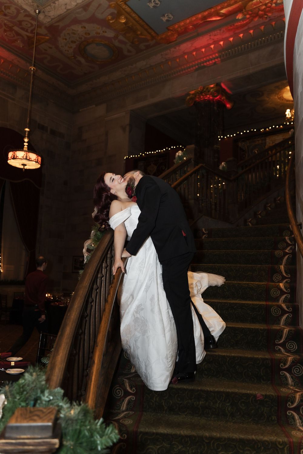 Bride and groom on the grand staircase at the society room ballroom wedding venue in Hartford connecticut located near Hartford City hall