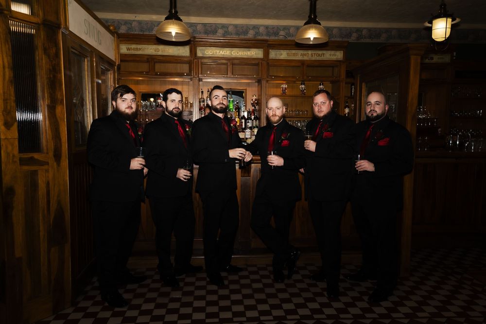 groomsmen photo at the society room bar, group photo wedding venue in Hartford connecticut