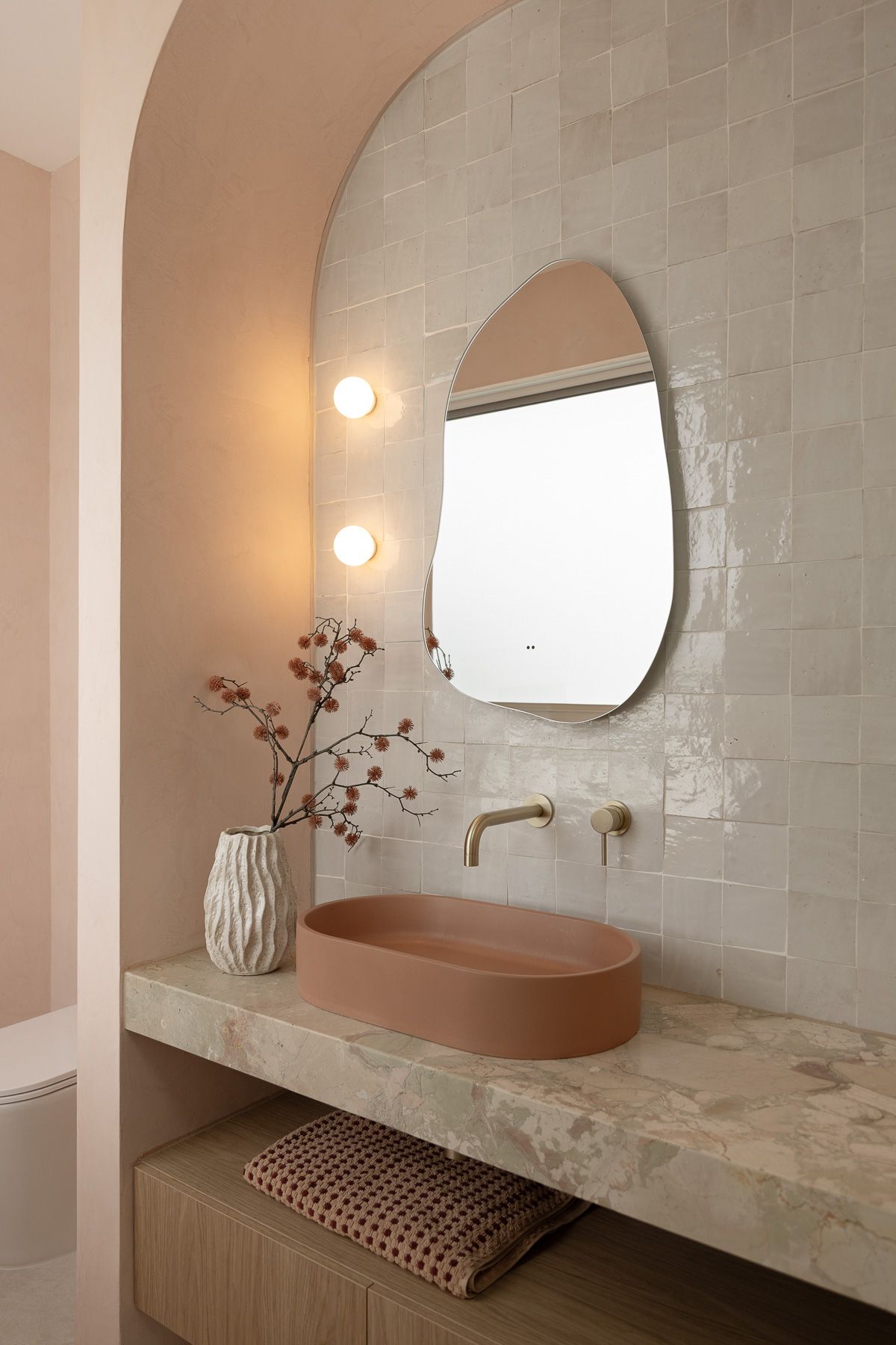 Architectural interior photography of luxury bathroom design with custom stone vanity in Miranda, Sutherland Shire.