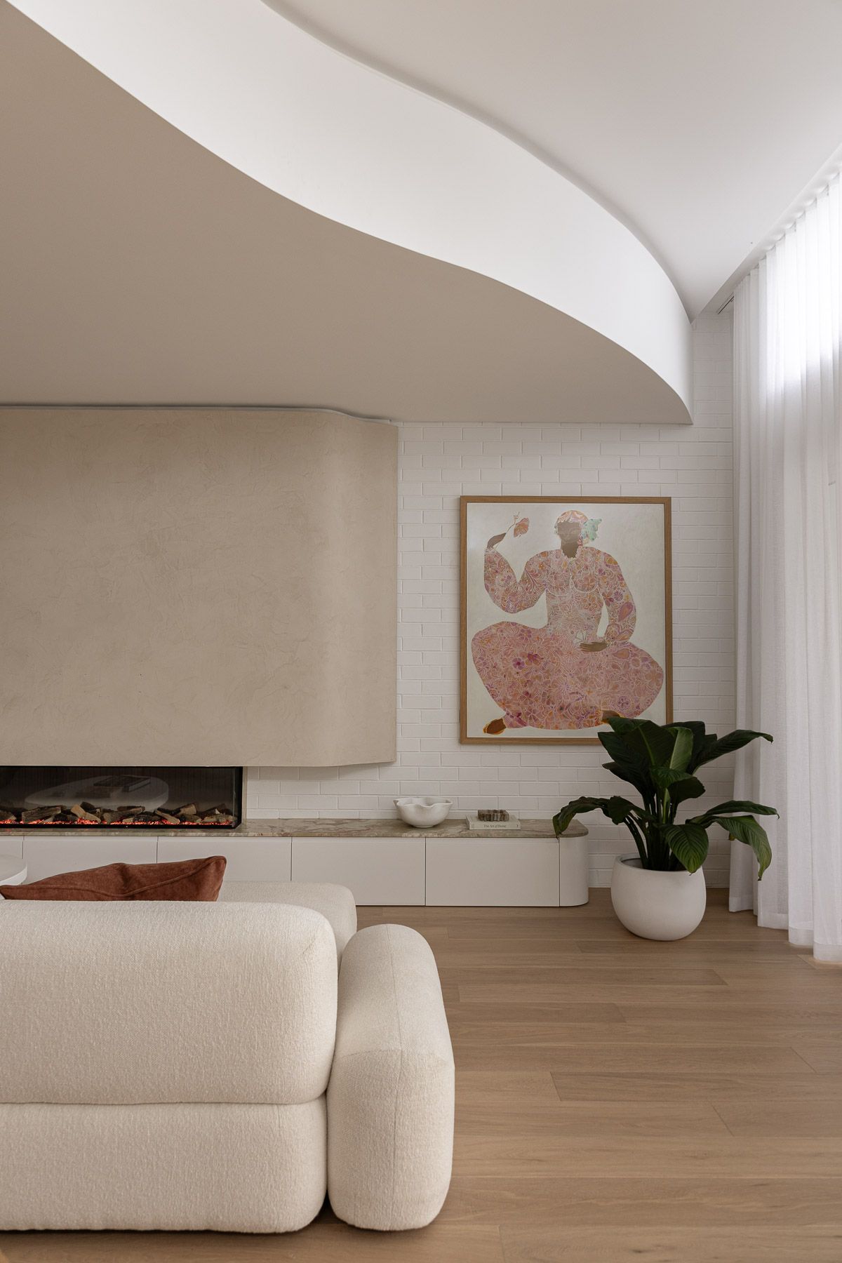 Architectural interior photography highlighting curved ceiling design and contemporary living space in Miranda NSW.