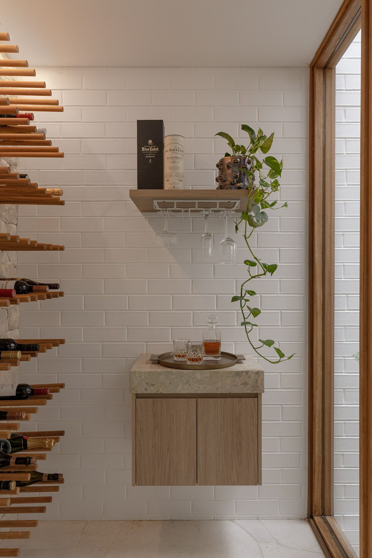 Interior photography of custom wine cellar and contemporary architectural detailing in luxury Miranda duplex.