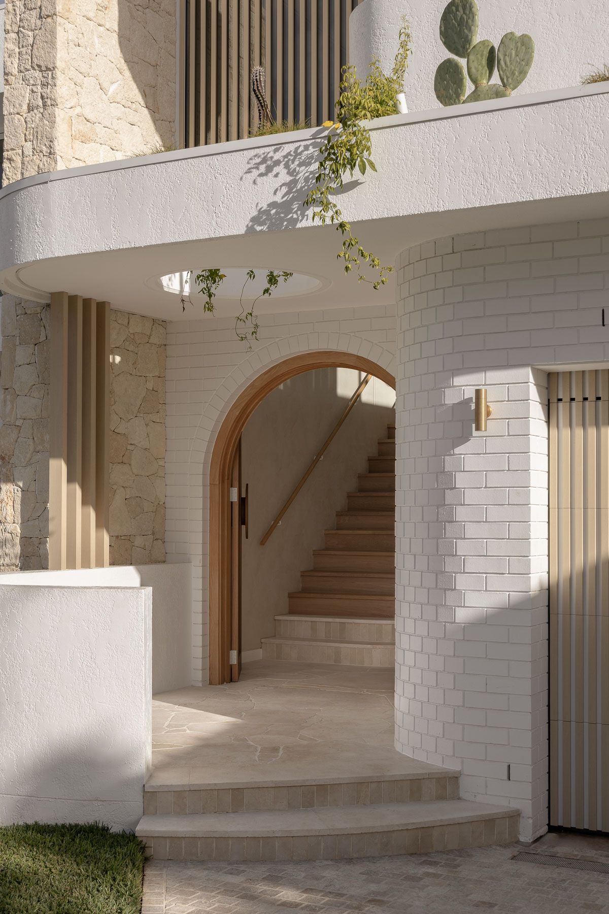 Exterior architectural photography of luxury duplex entrance in Miranda NSW captured for builder and building designer.