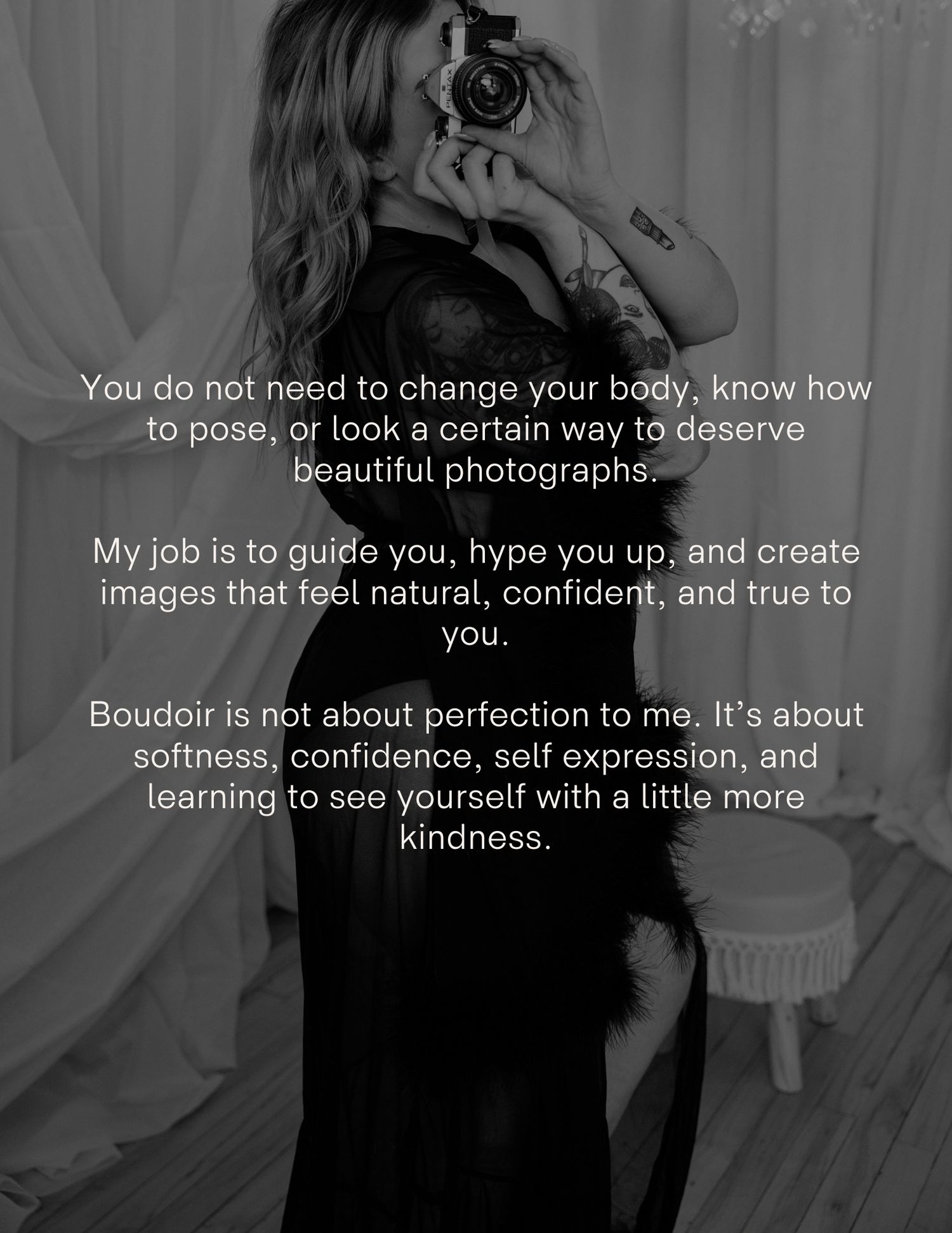 A woman in black lingerie holds a camera in a moody boudoir photography studio with empowering text overlay.