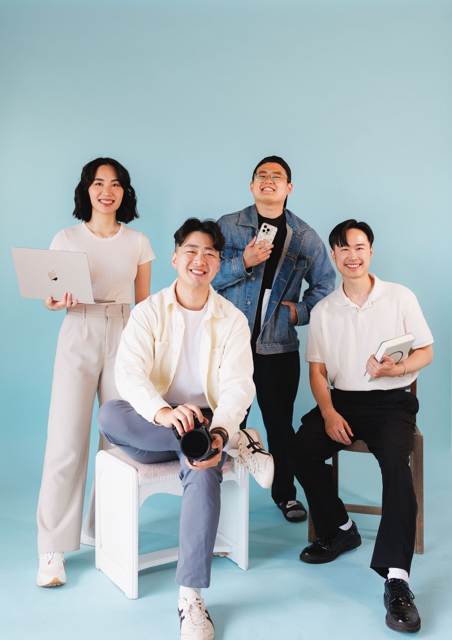 A series of casual lifestyle photos showing people in white and blue outfits posing against a light blue background.