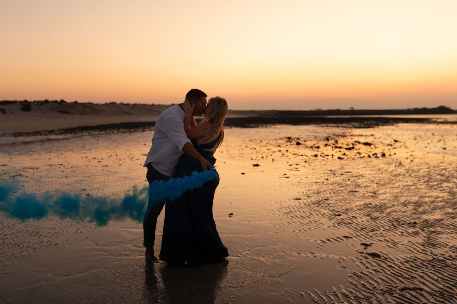 maternity photoshoot blue gender reveal smoke photoshoot in abu dhabi beach