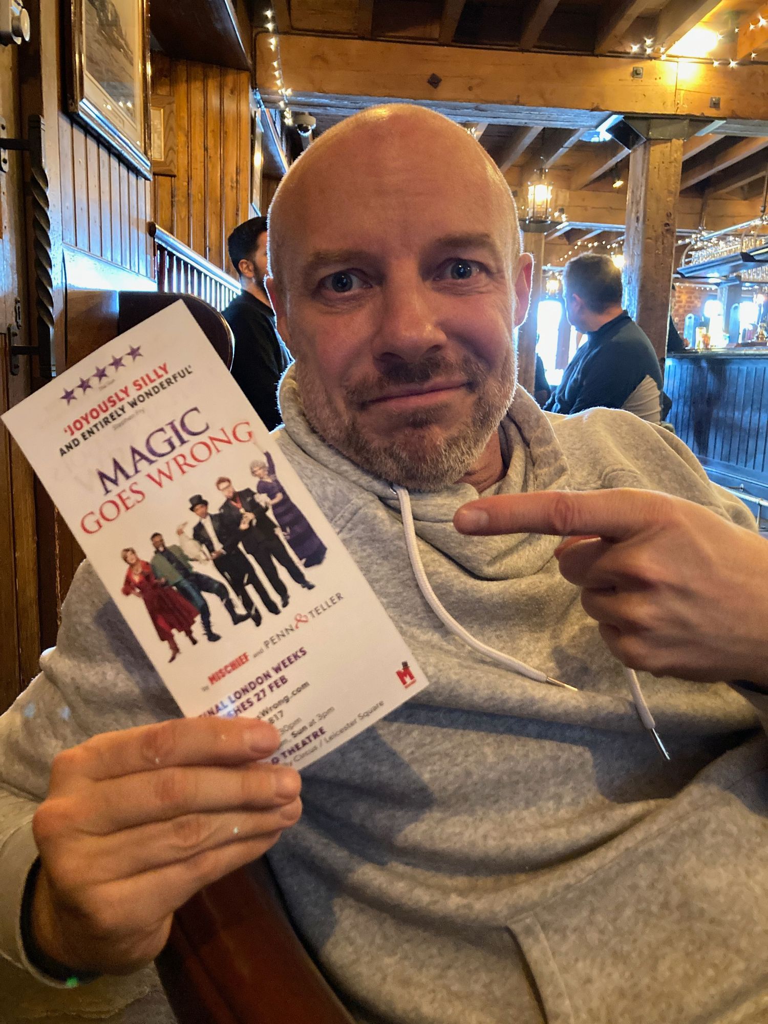 Photographer Gary Williams sitting in a theatre bar
