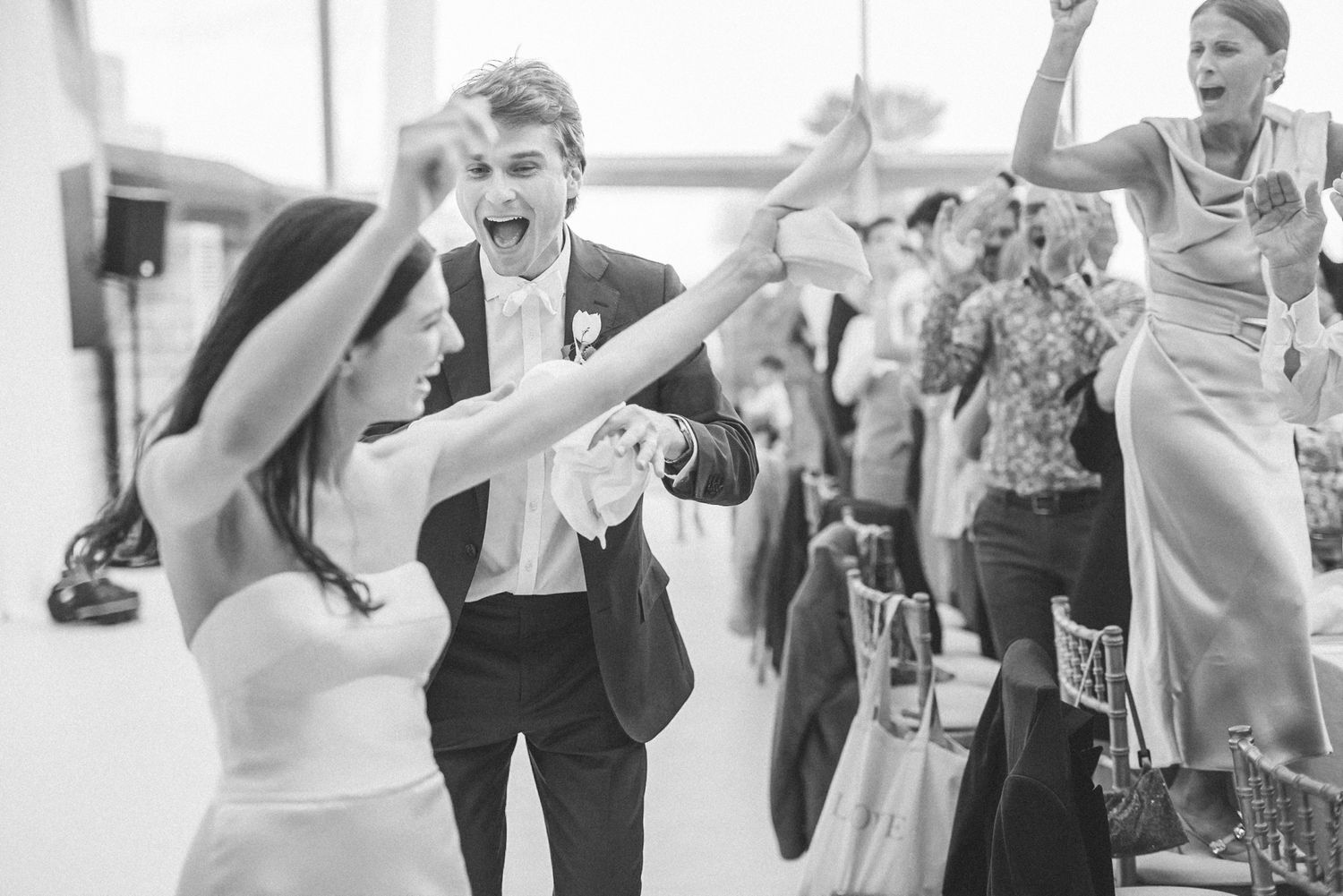 Vibrant and joyful moments from the recepti celebration at Forte da Cruz during a Destination Wedding in Portugal, filled with music & dance