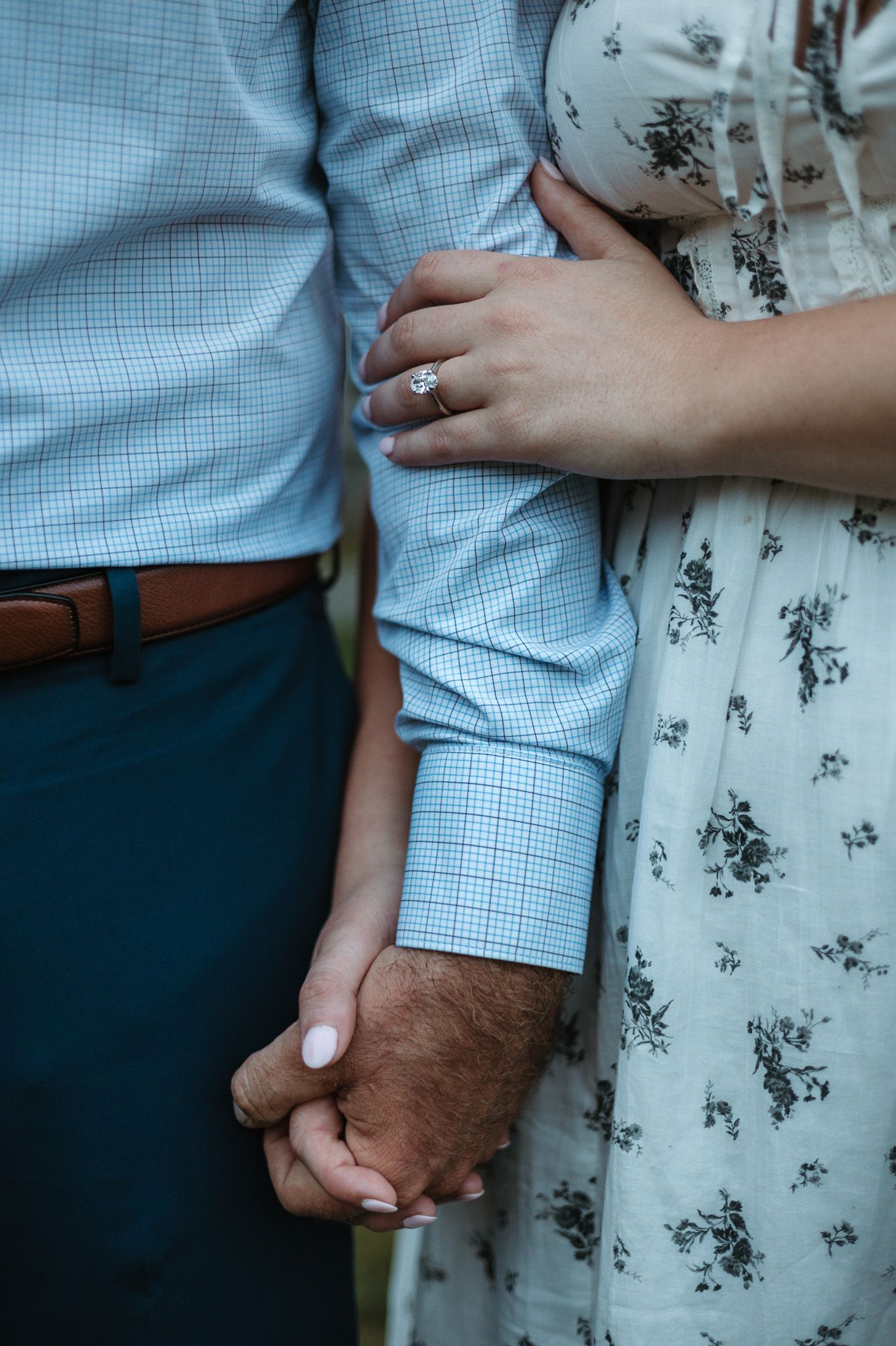 close up ring shot, surprise proposal, engaged in front of a tobacco farm in Manchester Connecticut.