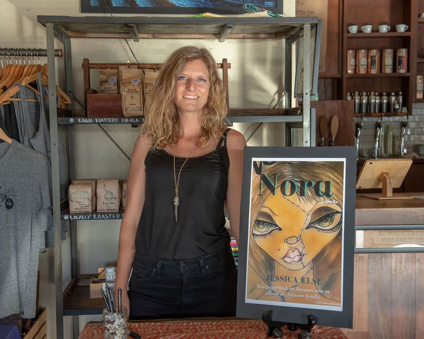 Retail shop interior with vintage coffee poster and merchandise display.