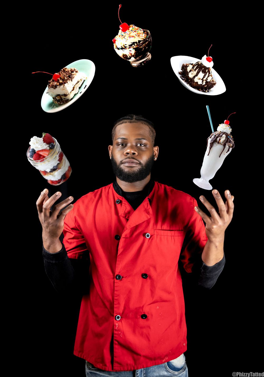 Chef in red uniform juggling desserts against black background.
