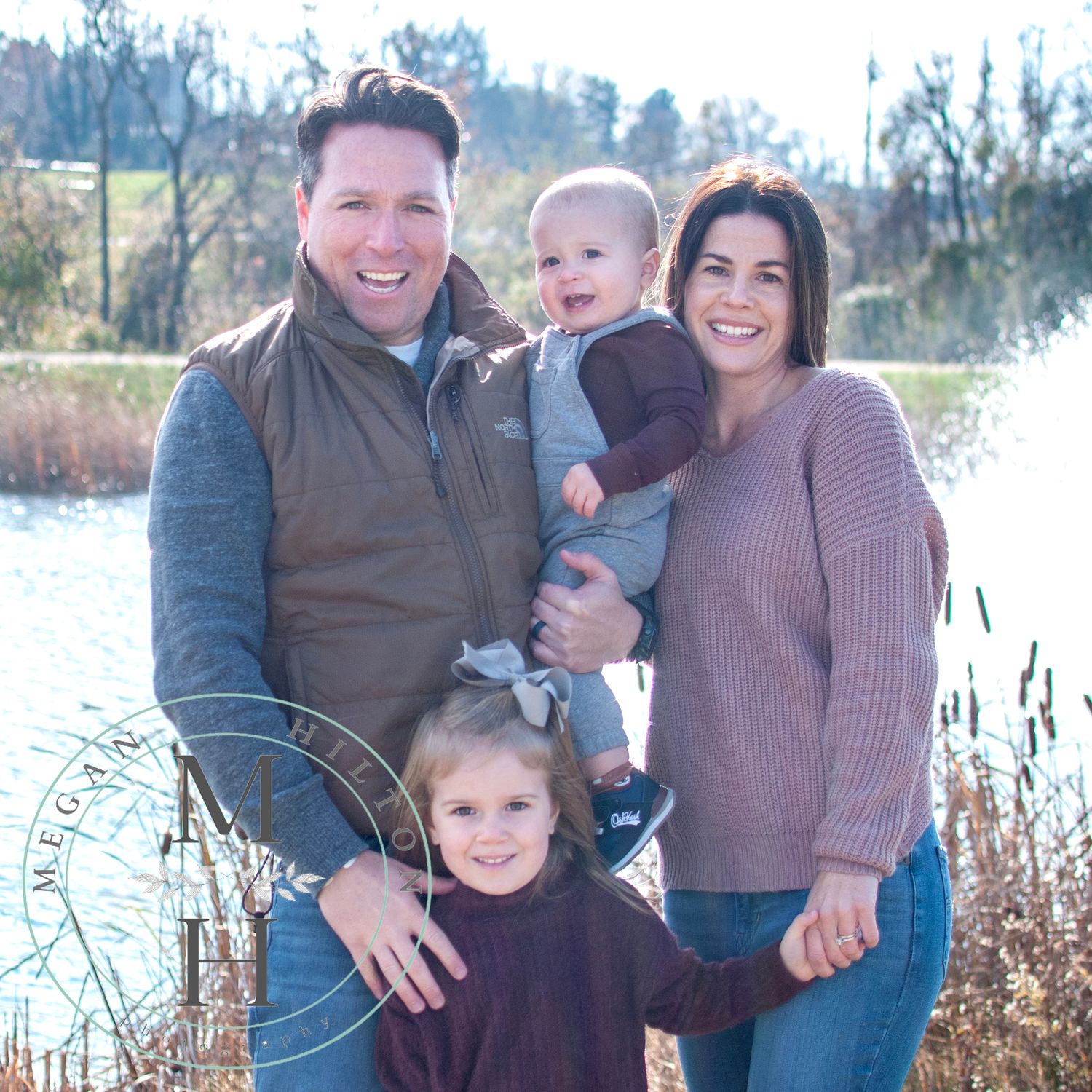 Family of four with young girl and baby boy