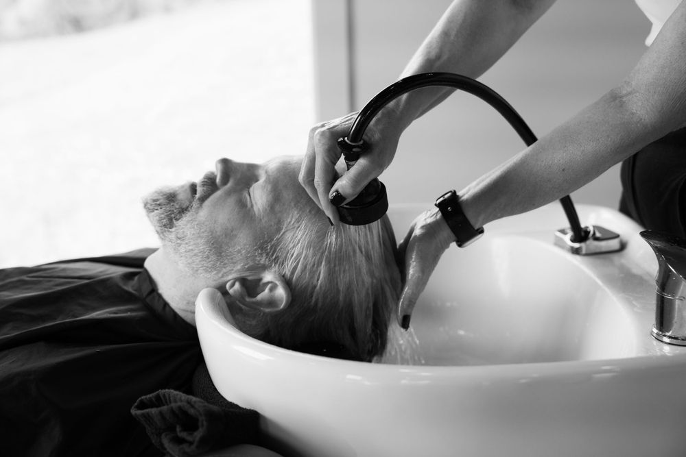 commercial photo for a hair salon, washing hair