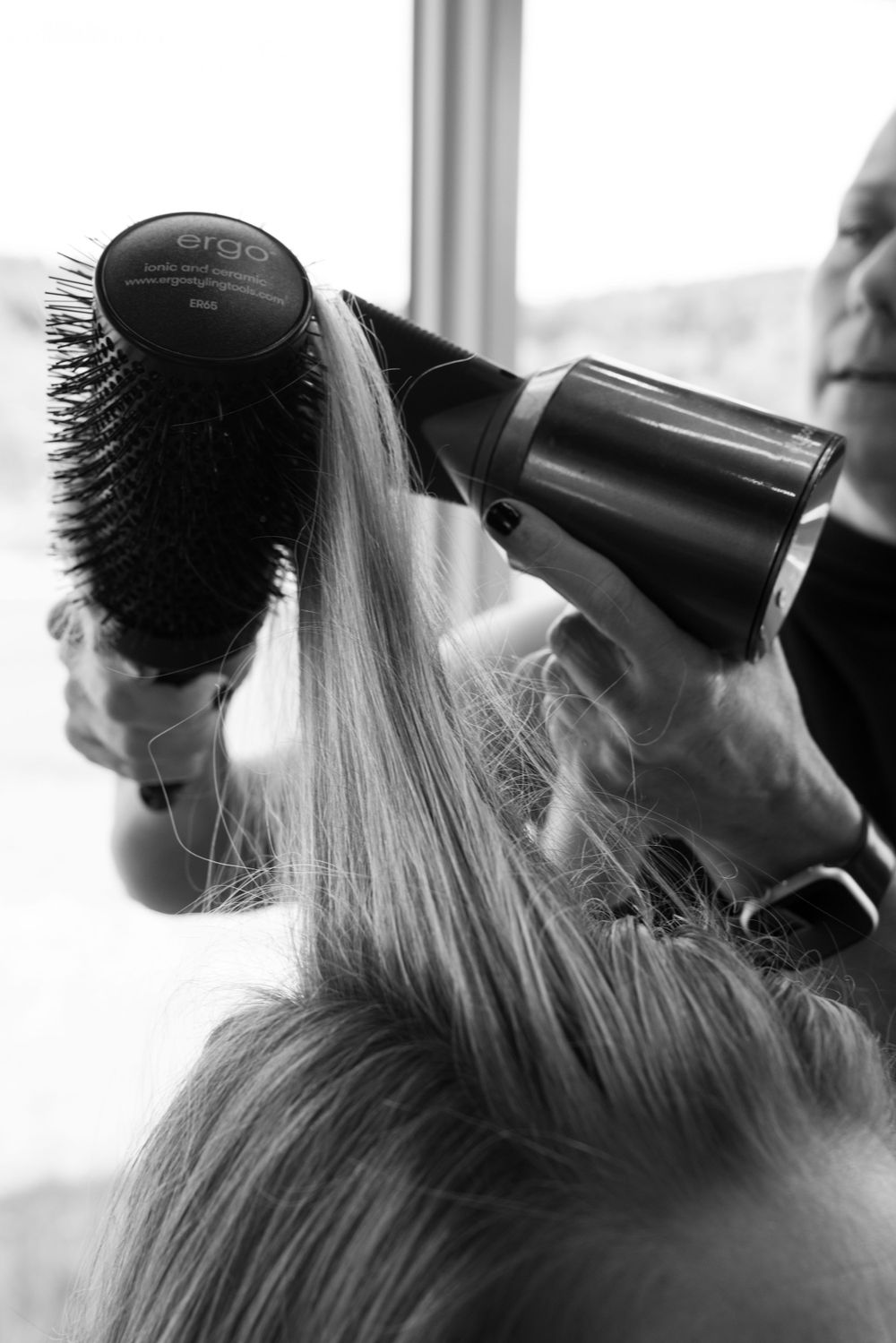 commercial photo for a hair salon, drying hair