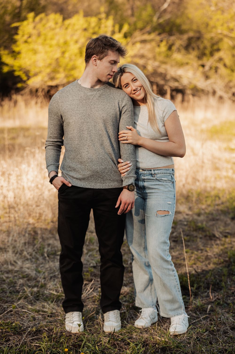 A series of intimate outdoor photos showing legs and casual clothing against a golden sunlit natural background.