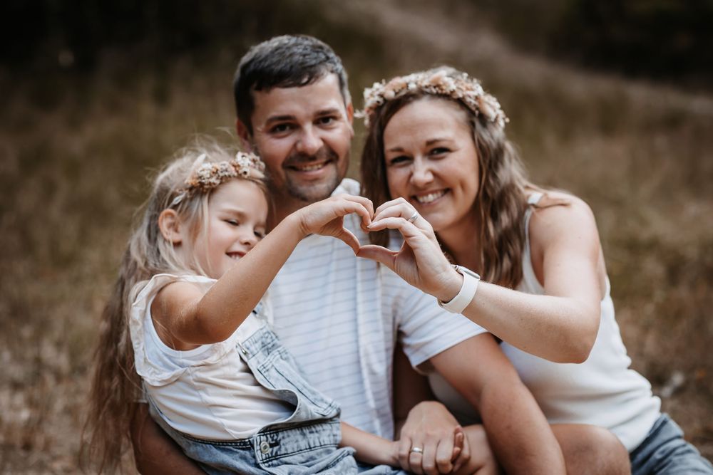 Natural lifestyle family photography showing joyful interactions outdoors.