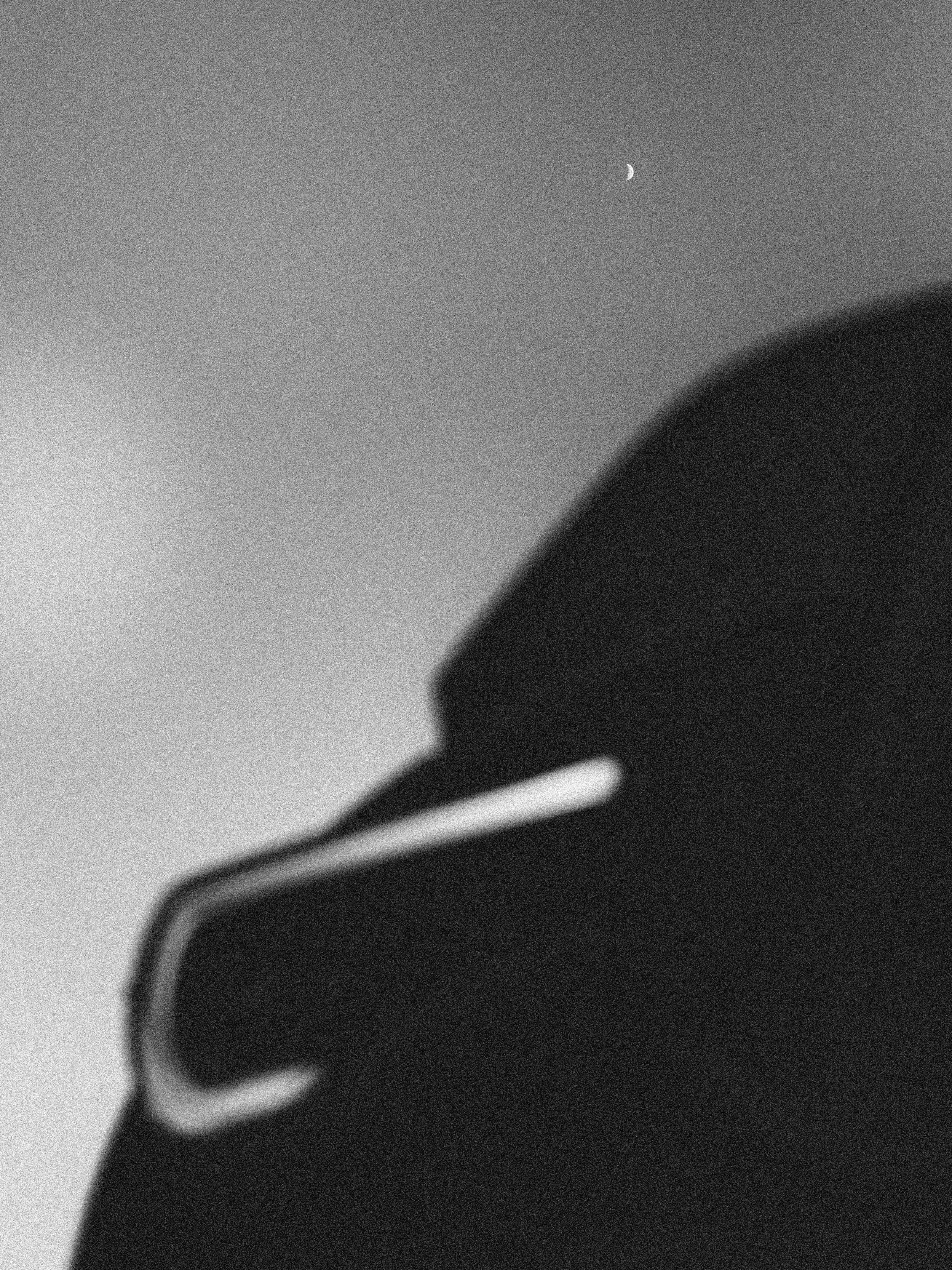 A black and white silhouette profile shows a Toyota GT86 with the moon in the background.