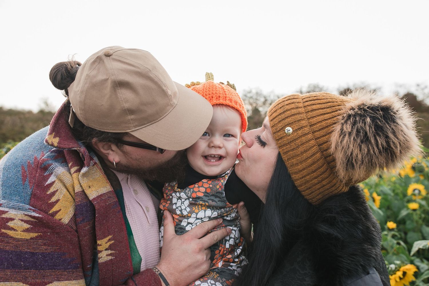 Cozy autumn family moment at pumpkin patch with warm knit hats. Photographer. Hull. East Yorkshire. Photography