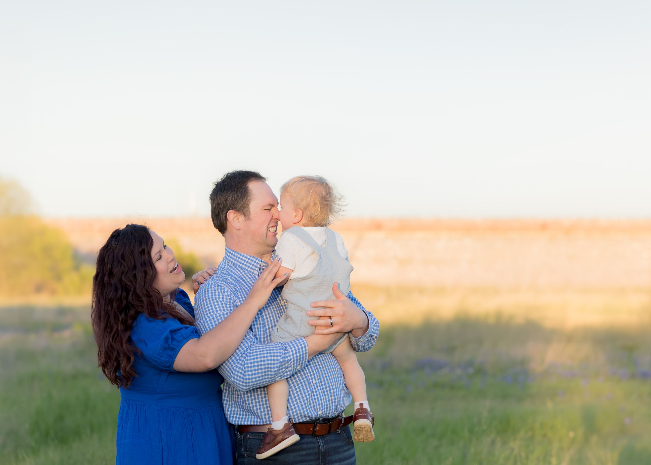 Family laughing at bluebonnet mini session cedar park brushy creek lake park veteran discount