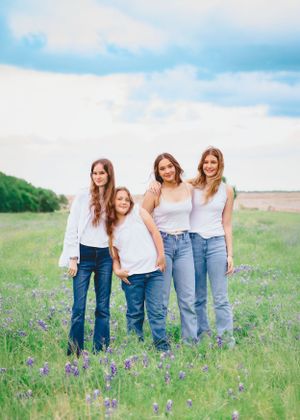 Best Friends Bluebonnet Mini Session Brushy Creek Cedar Park Texas 4 girls in white shirts and blue jeans in the texas bluebonnets. Bff