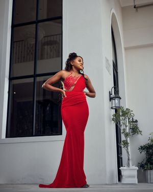 lady in red standing