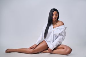 lady seating in studio