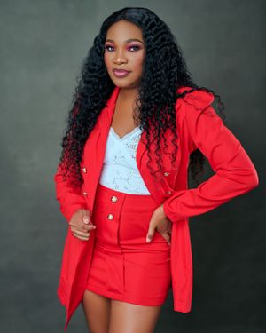 lady wearing a red suite