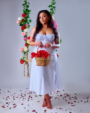 lady holding a blanket of flowers