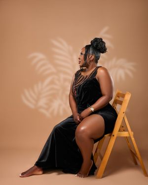 lady seating on a chair