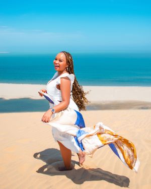 lady standing on the dunes