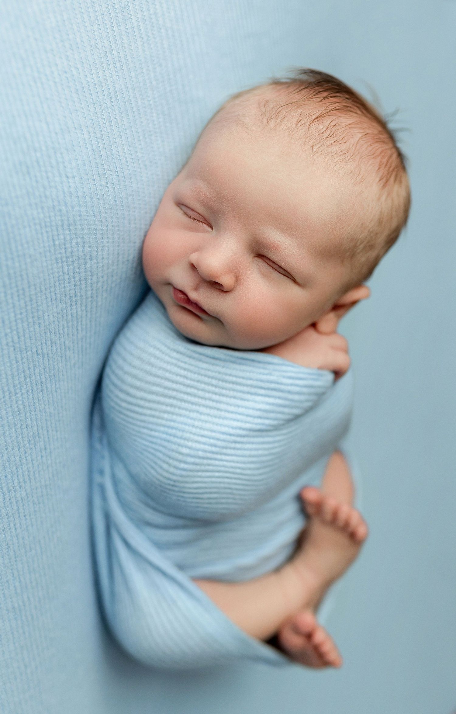 Newborn boy in light blue. Greenville SC newborn, Easley SC newborn, Upstate Sc newborn, Greenville newborn