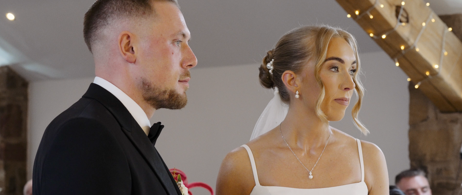 Elegant indoor wedding reception with twinkling lights and romantic atmosphere.