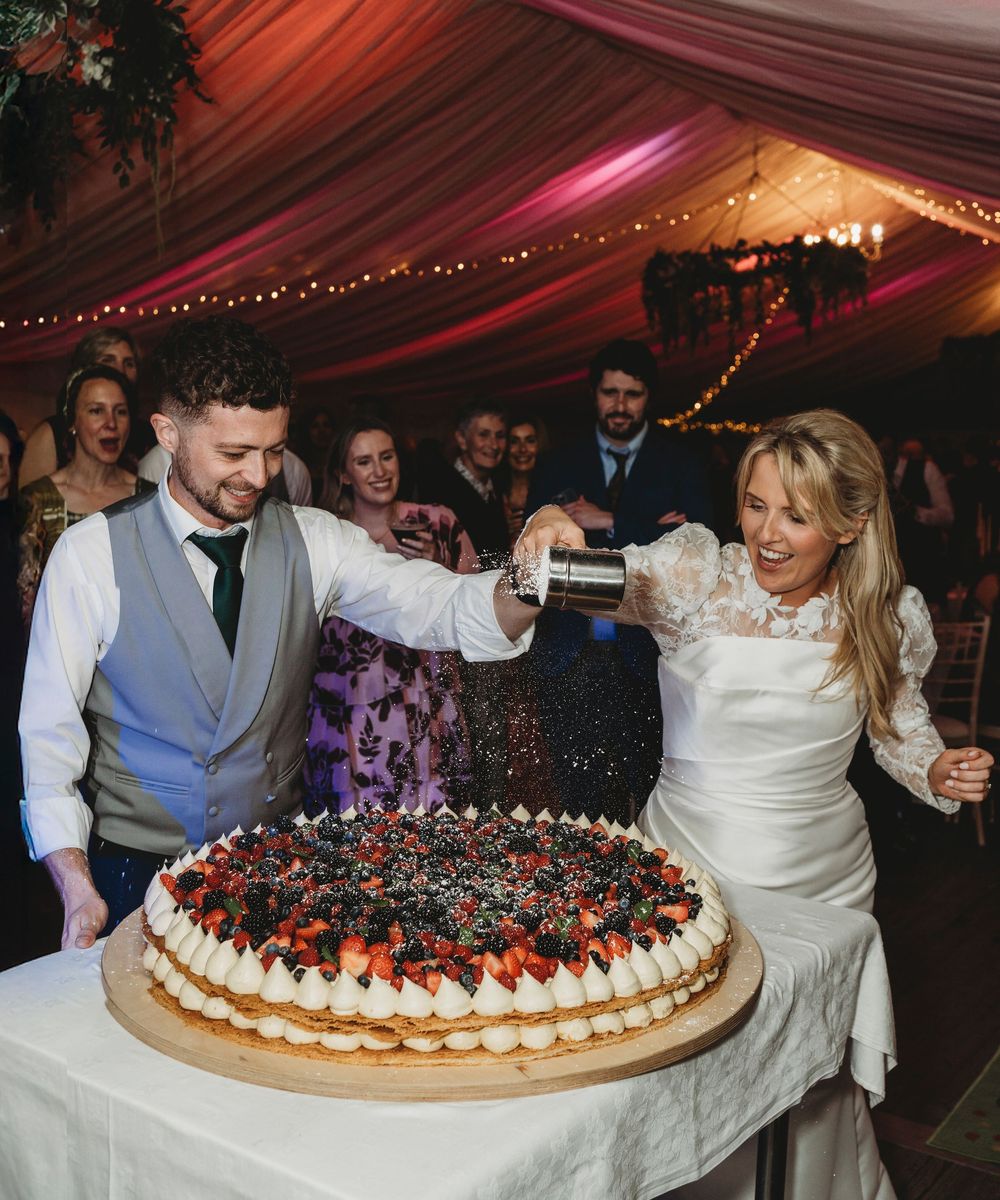 Wedding cake cutting and evening celebrations at Ceredigion West Wales wedding