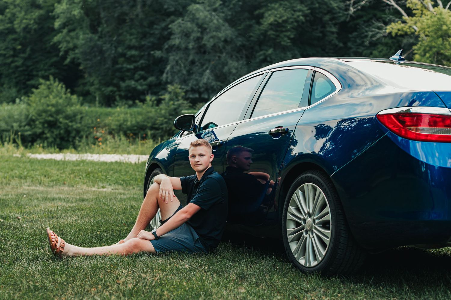 A series of photos showing a luxury car parked on grass during a sunset photo session.