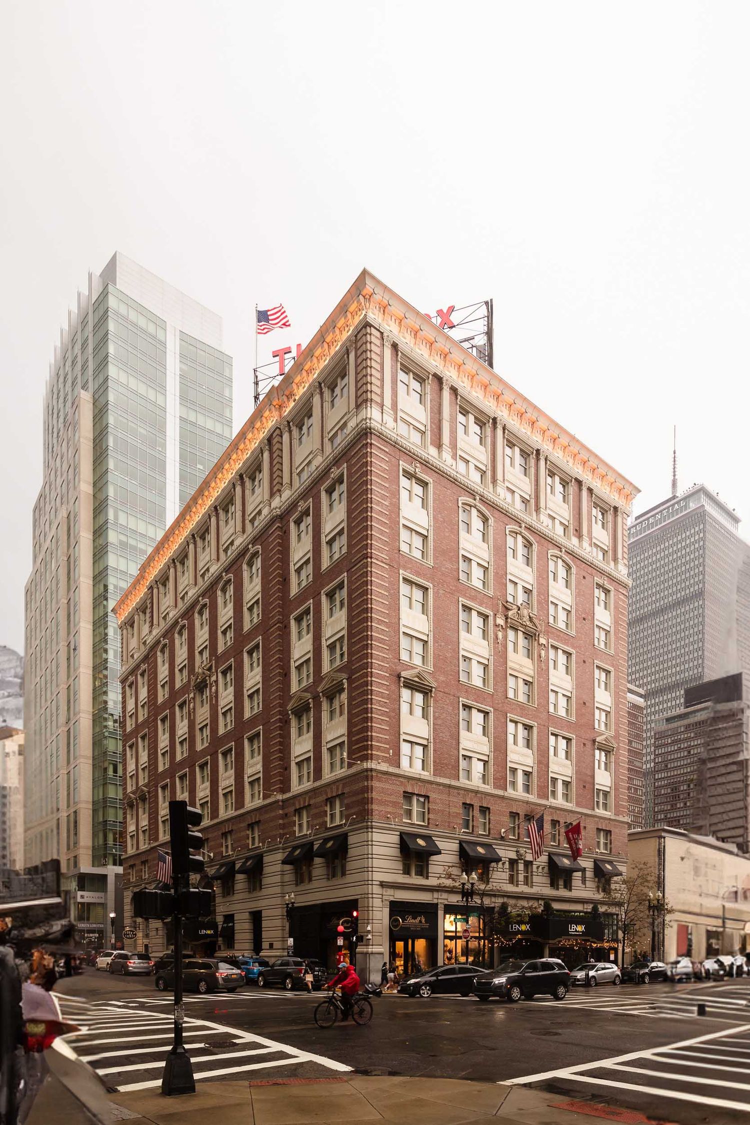 Exterior of Lenox Hotel Boston on Newbury Street with historic architecture and city streetscape