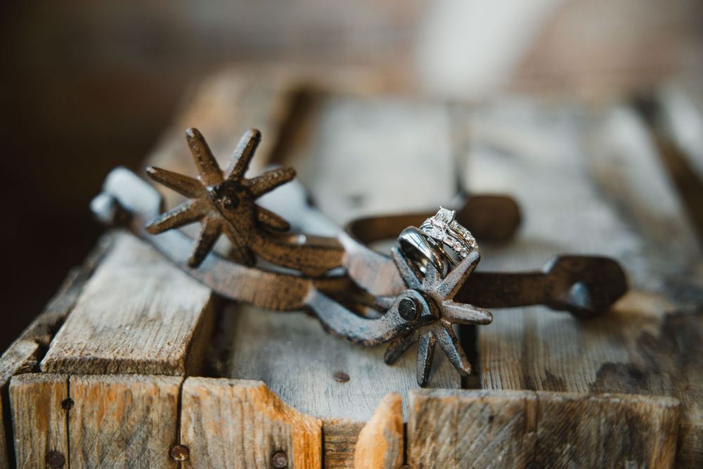 Star anise spices scattered on rustic wooden surface with selective focus and warm lighting.