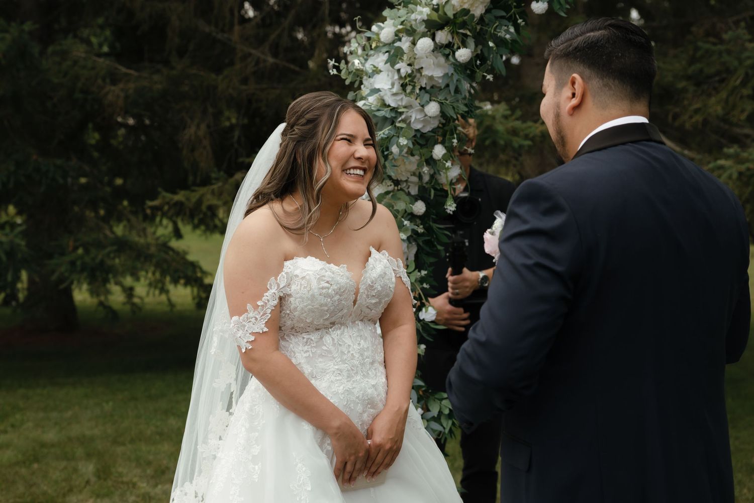 A wedding photoshoot sequence showing romantic moments between a couple in a garden setting.